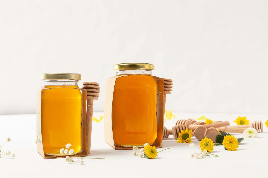 pure honey in two jars