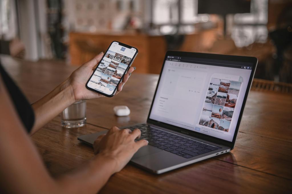 a women using laptop and a phone simultaneously