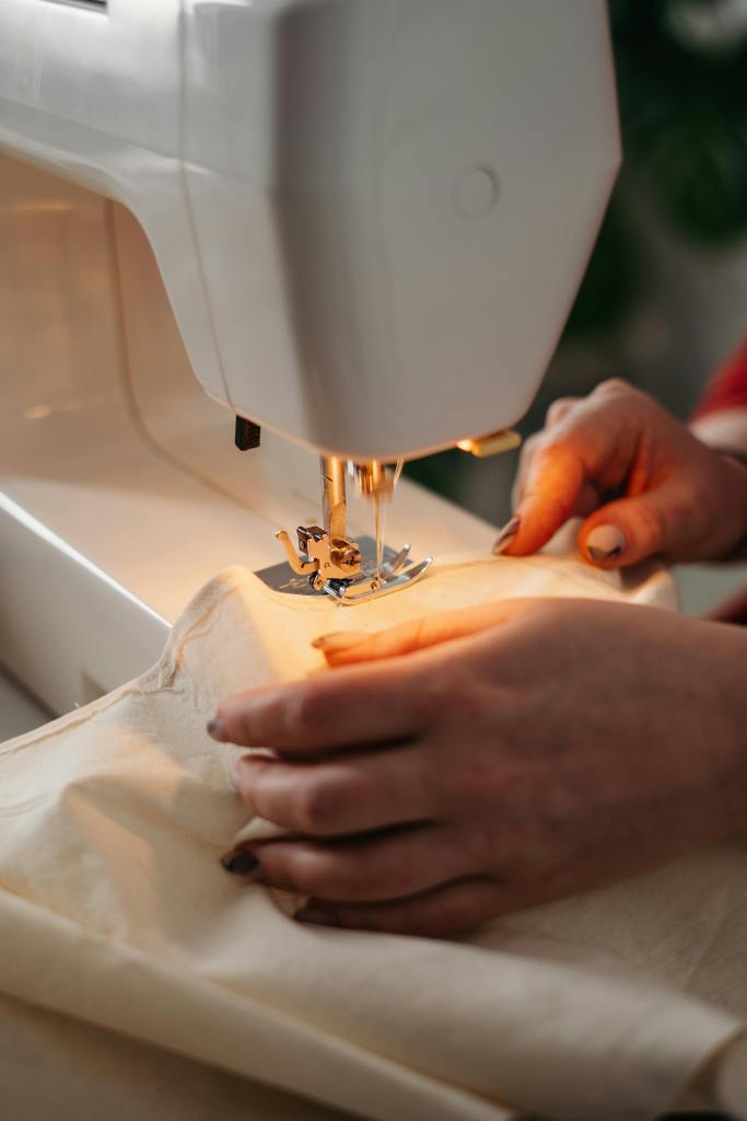 tailor using sewing machine