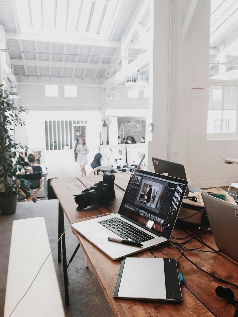 Camera and laptops on a table